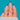 Pair of Gold knot and Amethyst earrings resting on the hand