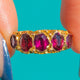Victorian 9ct Gold Garnet ring, front view of five oval Garnets and beaded Gold details