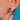 Gold Lapis Lazuli stud worn from an angled view